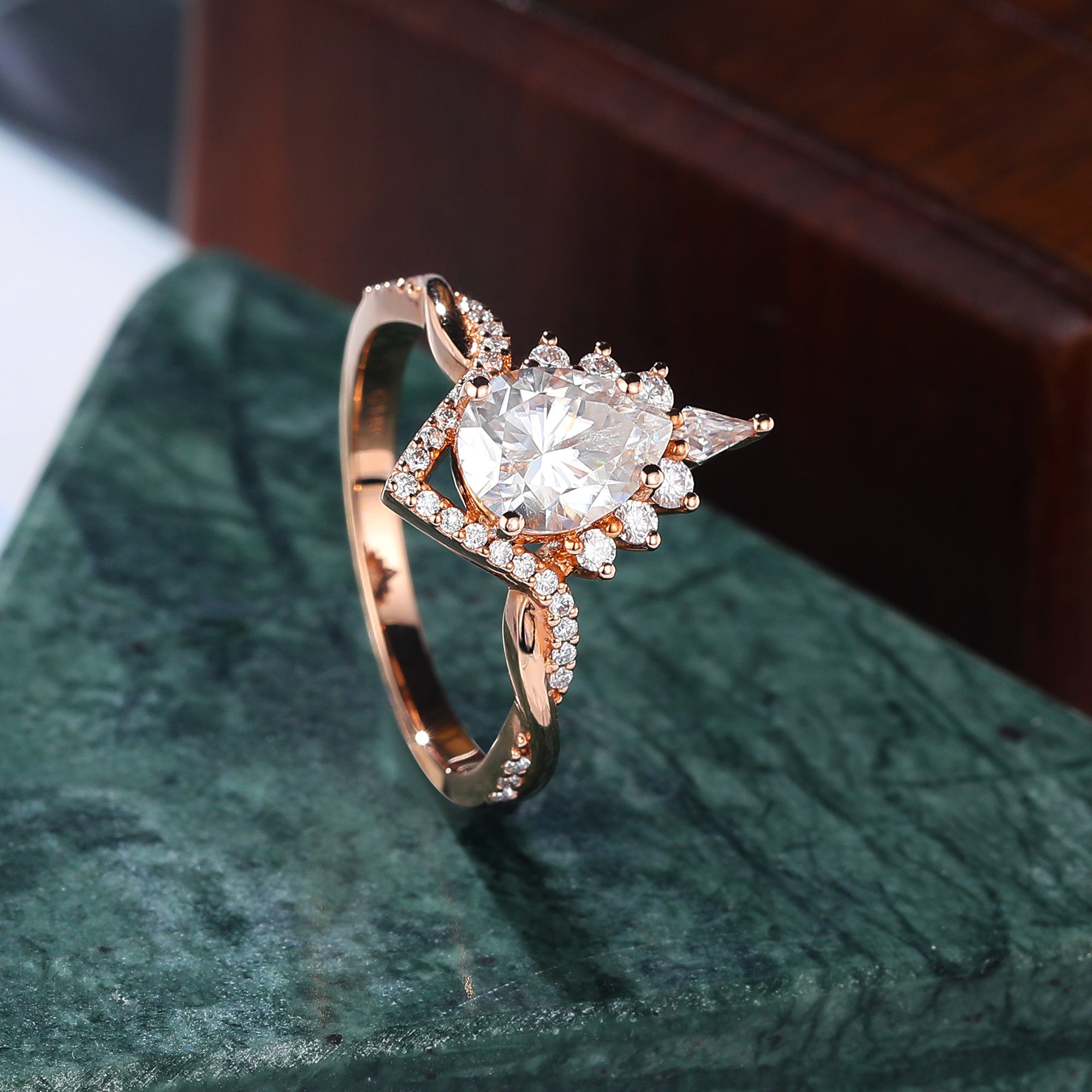 Pear shape moissanite rose gold engagement Ring.