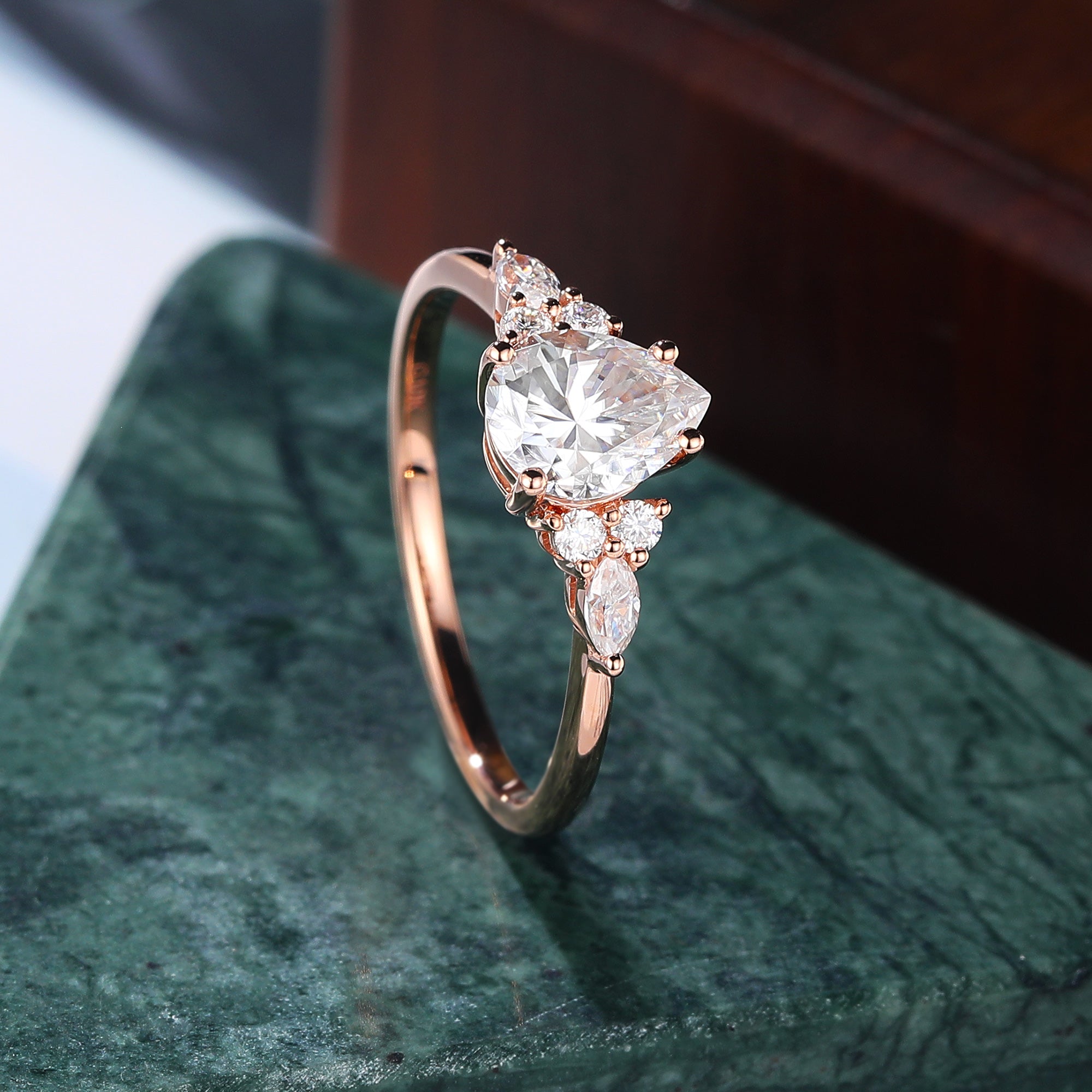 Pear shape moissanite rose gold engagement Ring.