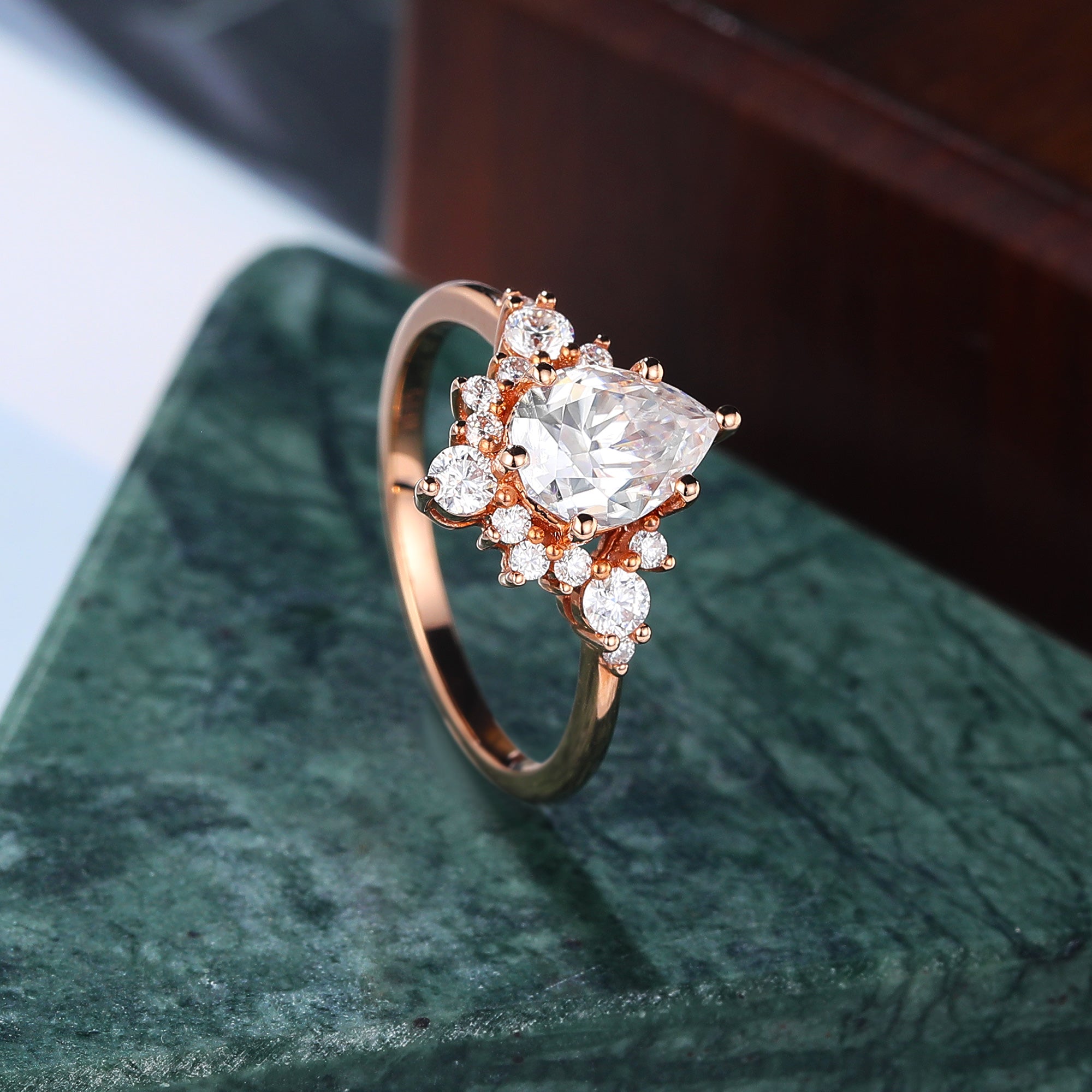 Pear shape moissanite rose gold engagement Ring.