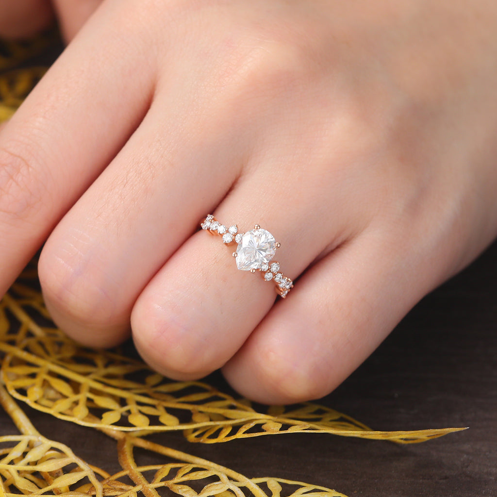 Pear shape  moissanite rose gold engagement Ring.