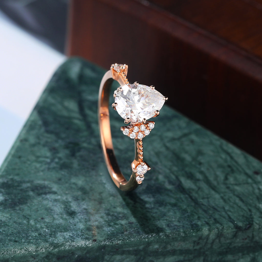 Pear shape moissanite rose gold engagement Ring.
