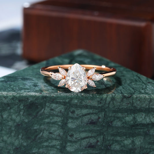 Pear shape moissanite rose gold engagement ring