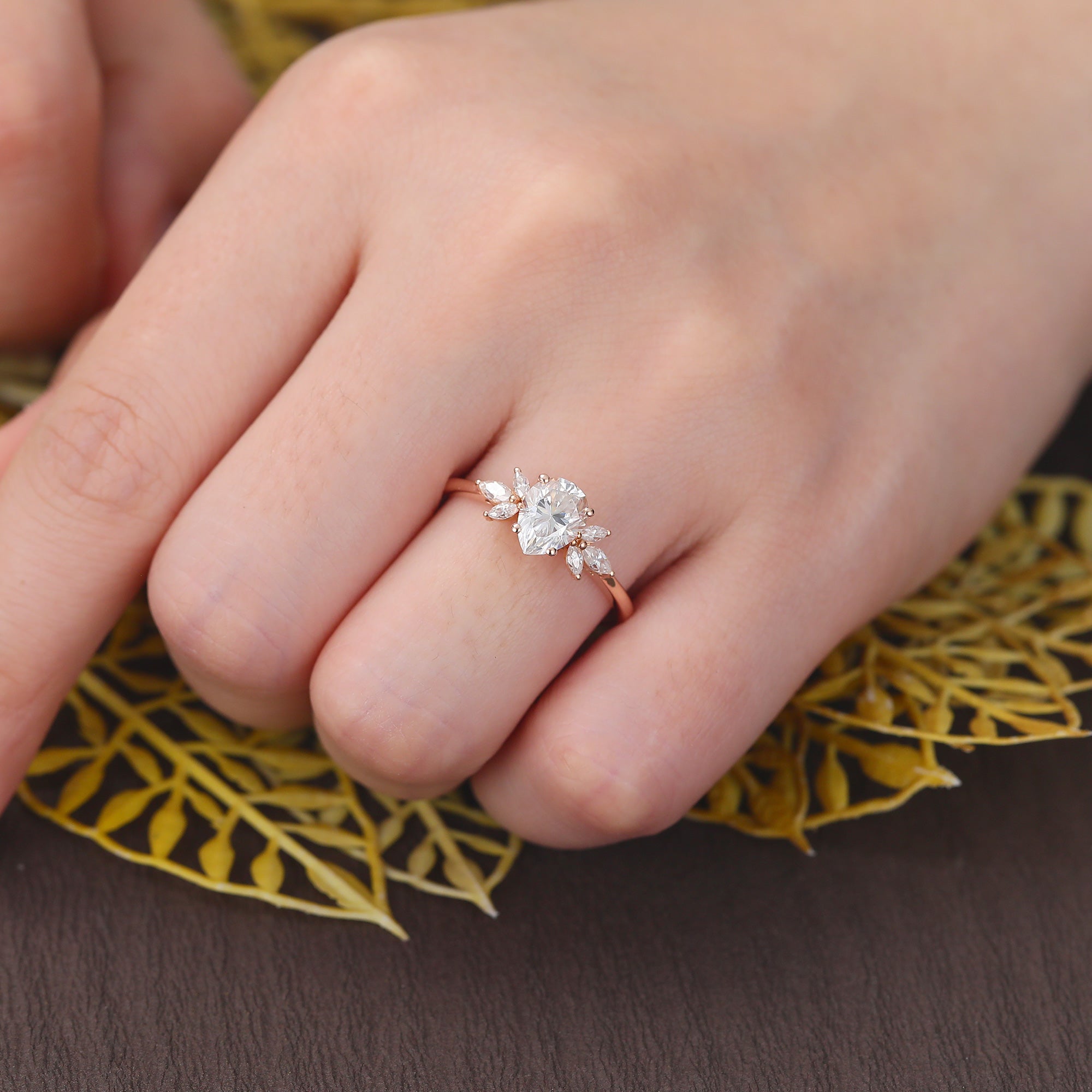 Pear shape moissanite rose gold engagement ring