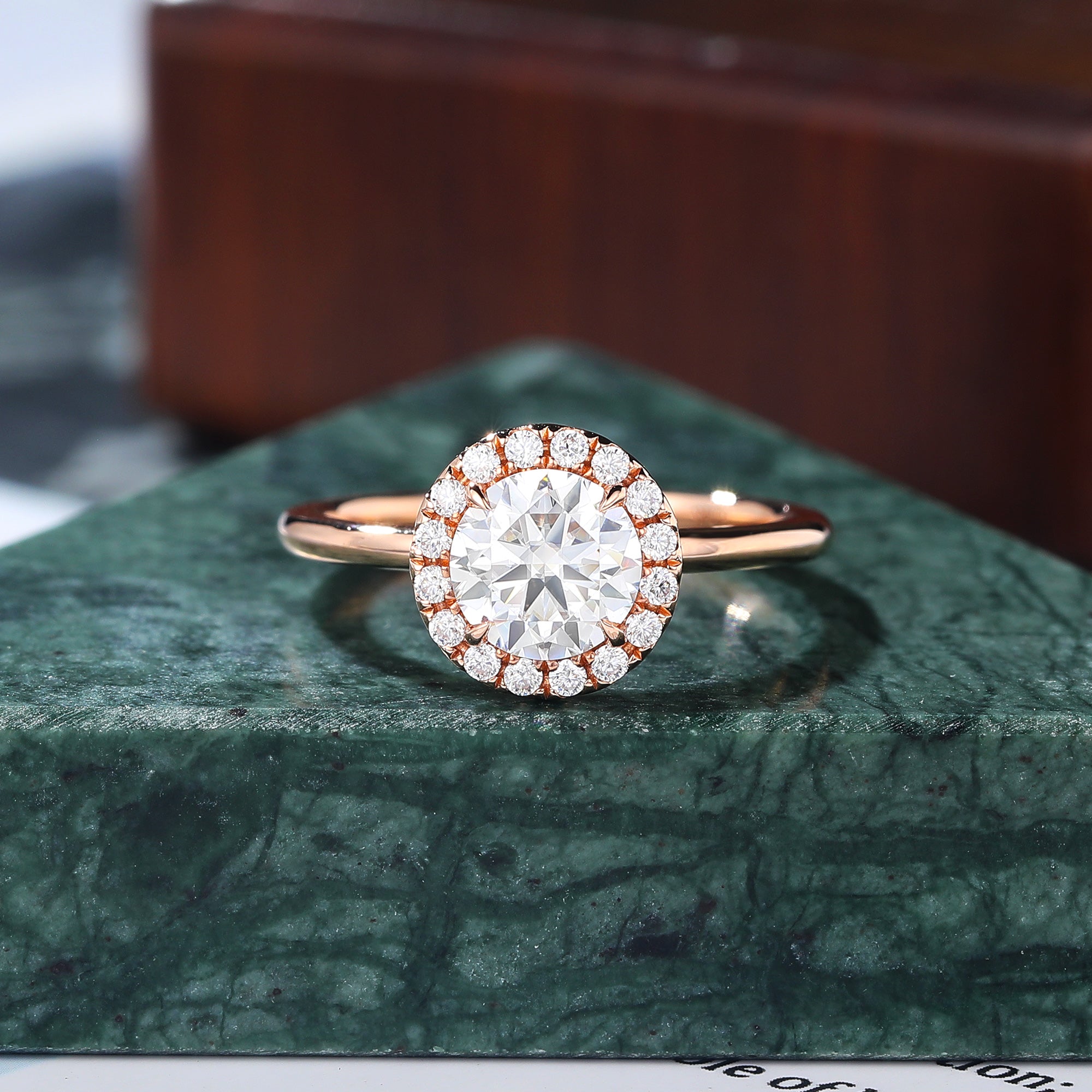 Round cut Moissanite rose gold engagement Ring.