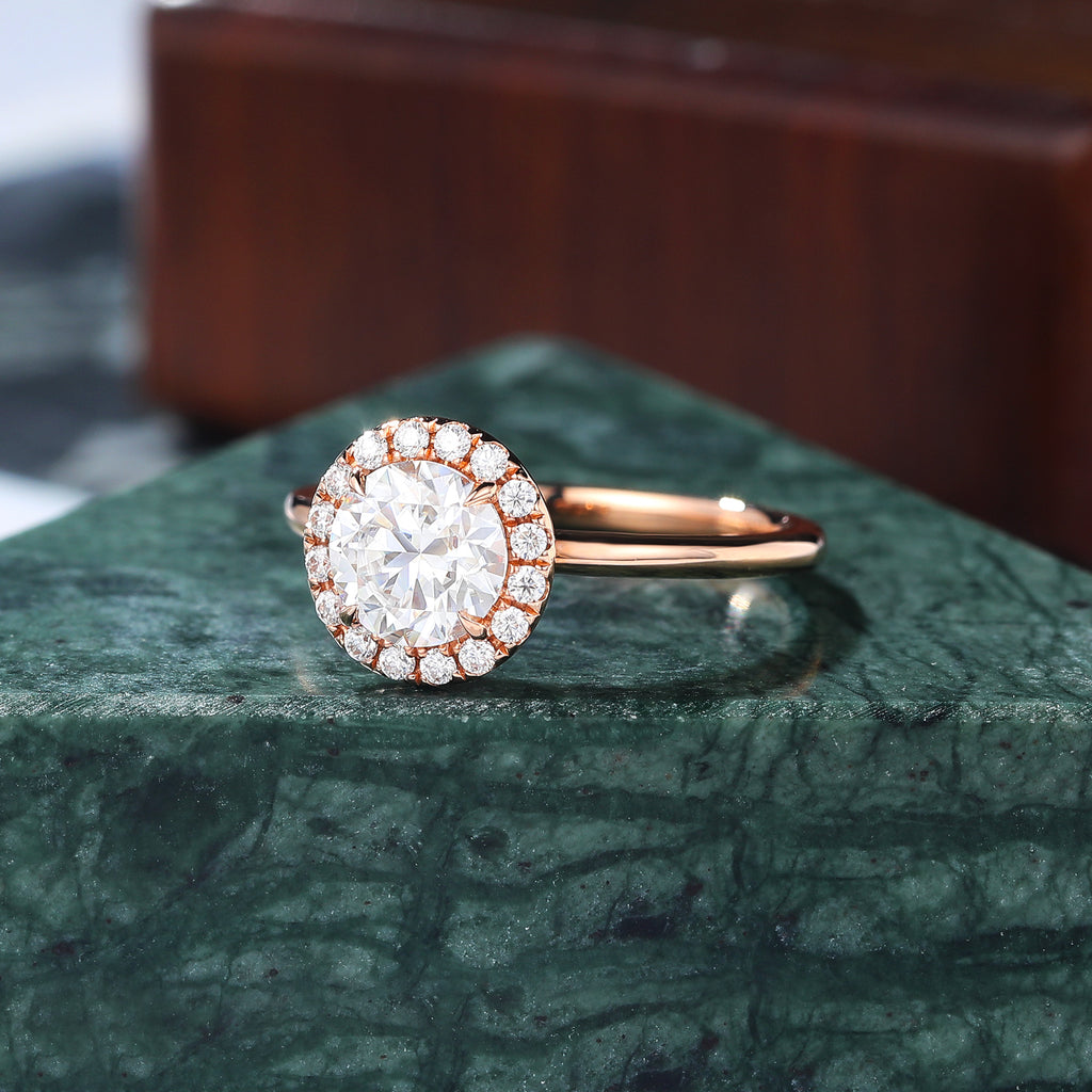 Round cut Moissanite rose gold engagement Ring.
