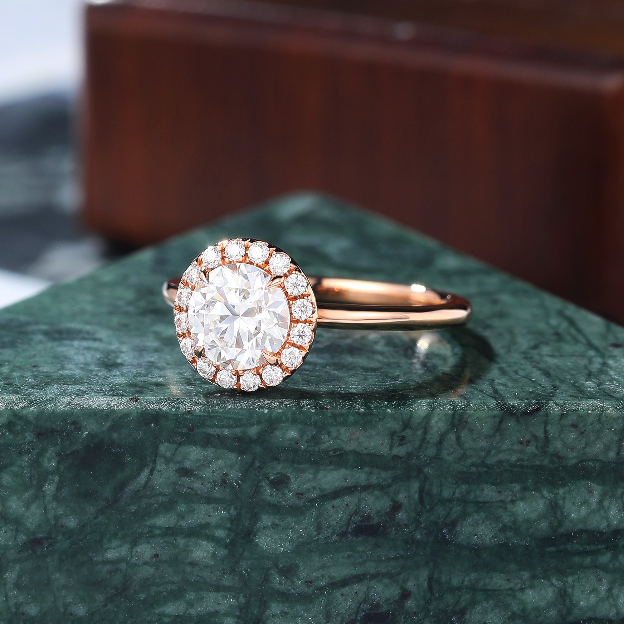 Round cut Moissanite rose gold engagement Ring.