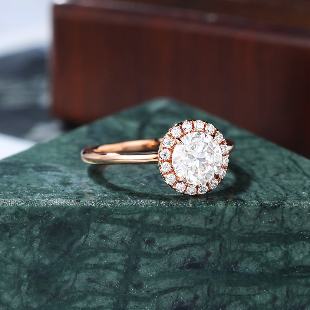 Round cut Moissanite rose gold engagement Ring.