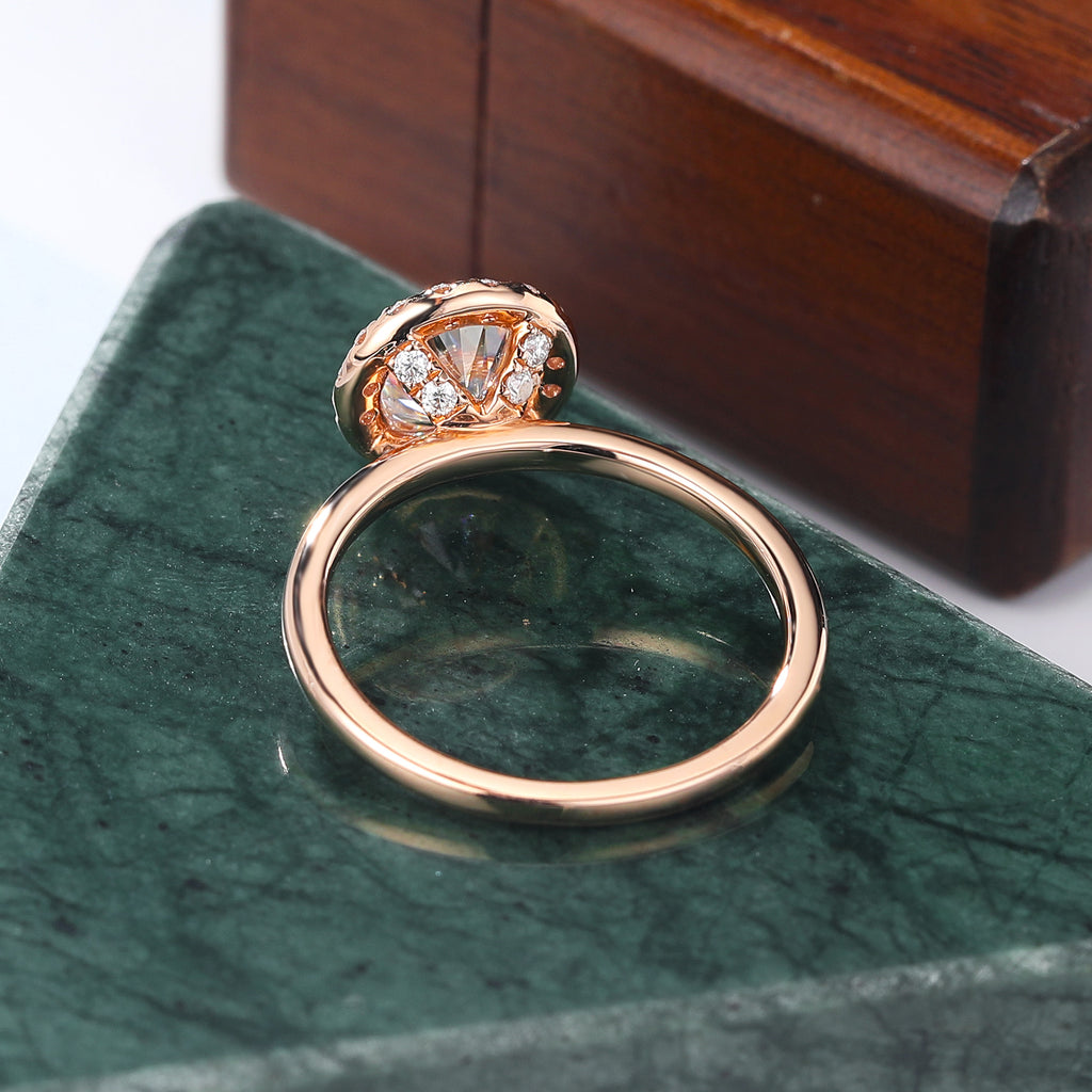 Round cut Moissanite rose gold engagement Ring.