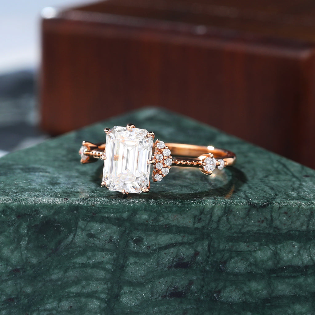Emerald cut moissanite rose gold engagement Ring.