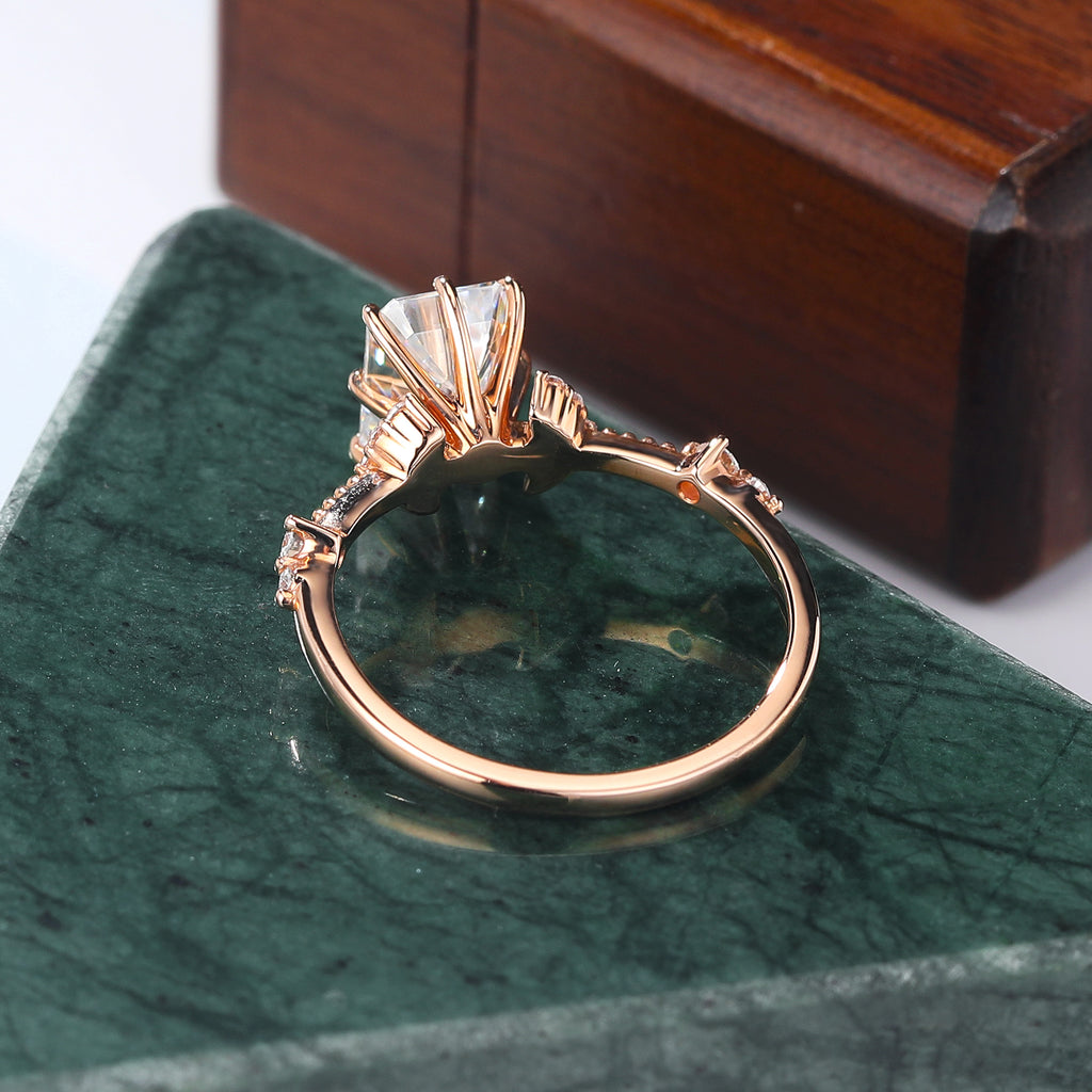 Emerald cut moissanite rose gold engagement Ring.