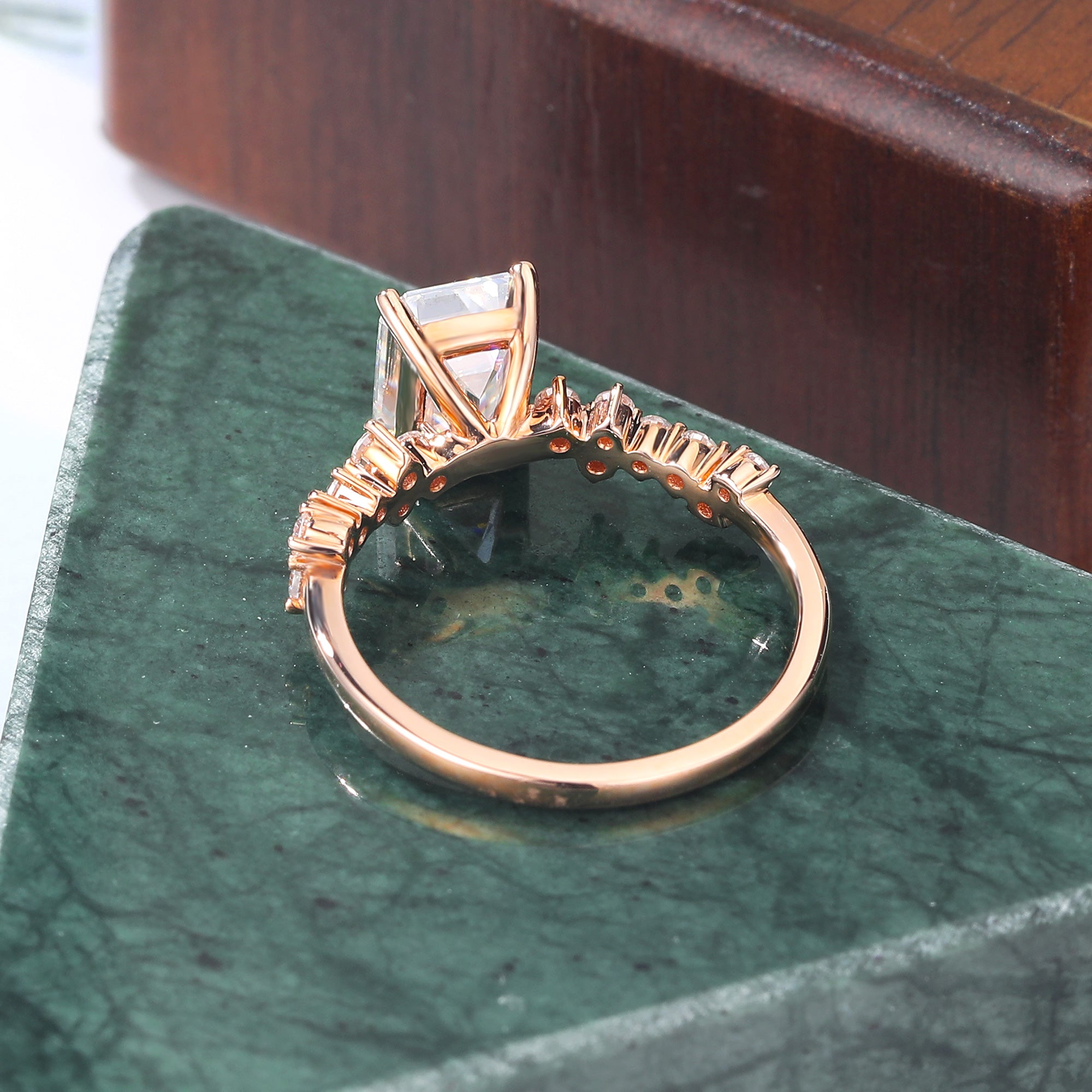 Emerald cut moissanite rose gold engagement Ring.