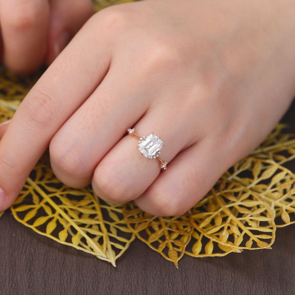 Emerald cut moissanite rose gold engagement Ring.