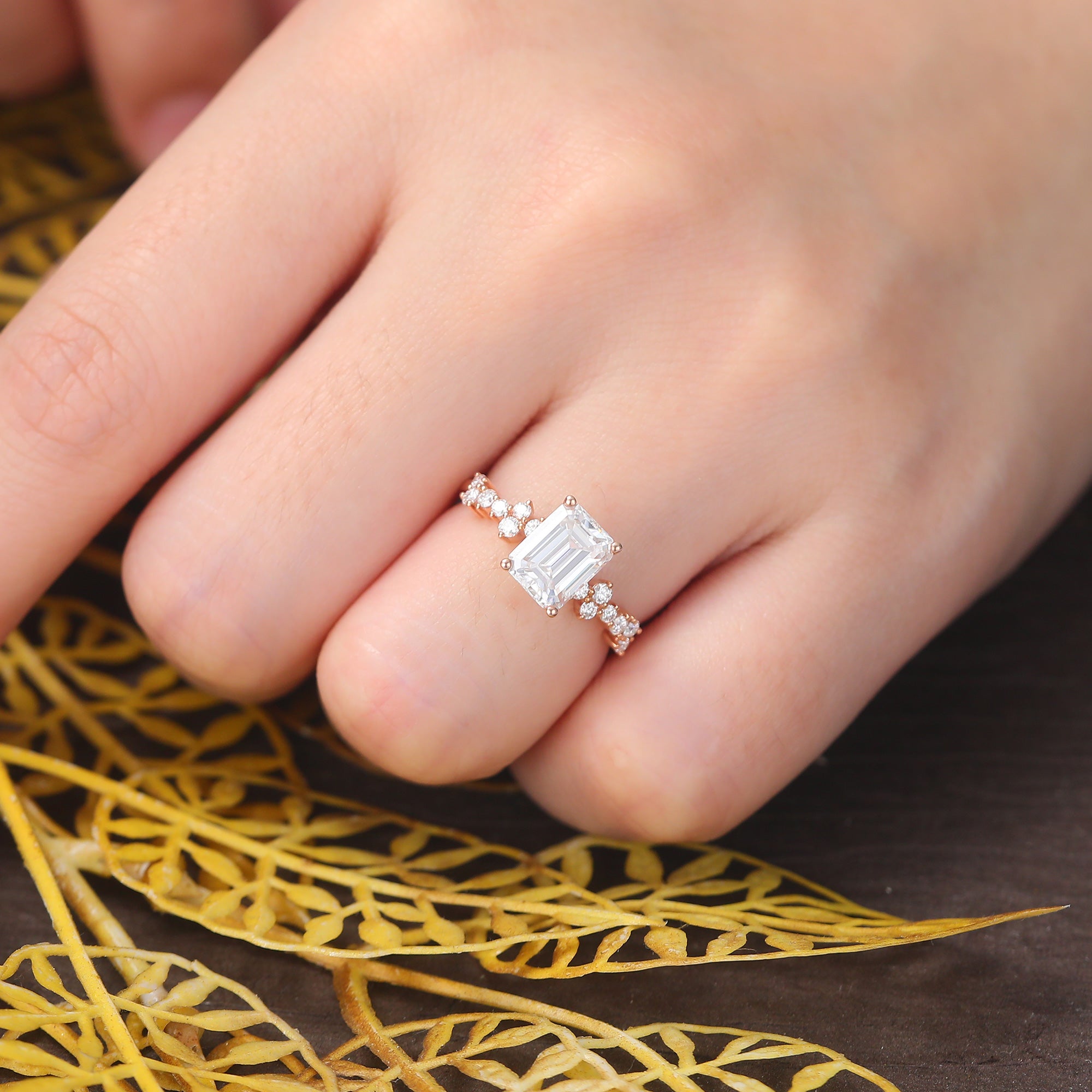 Emerald cut moissanite rose gold engagement Ring.