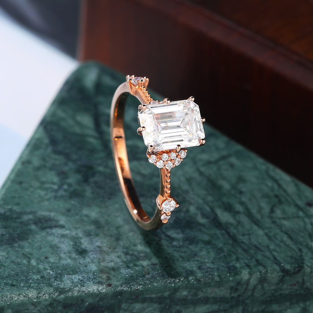Emerald cut moissanite rose gold engagement Ring.