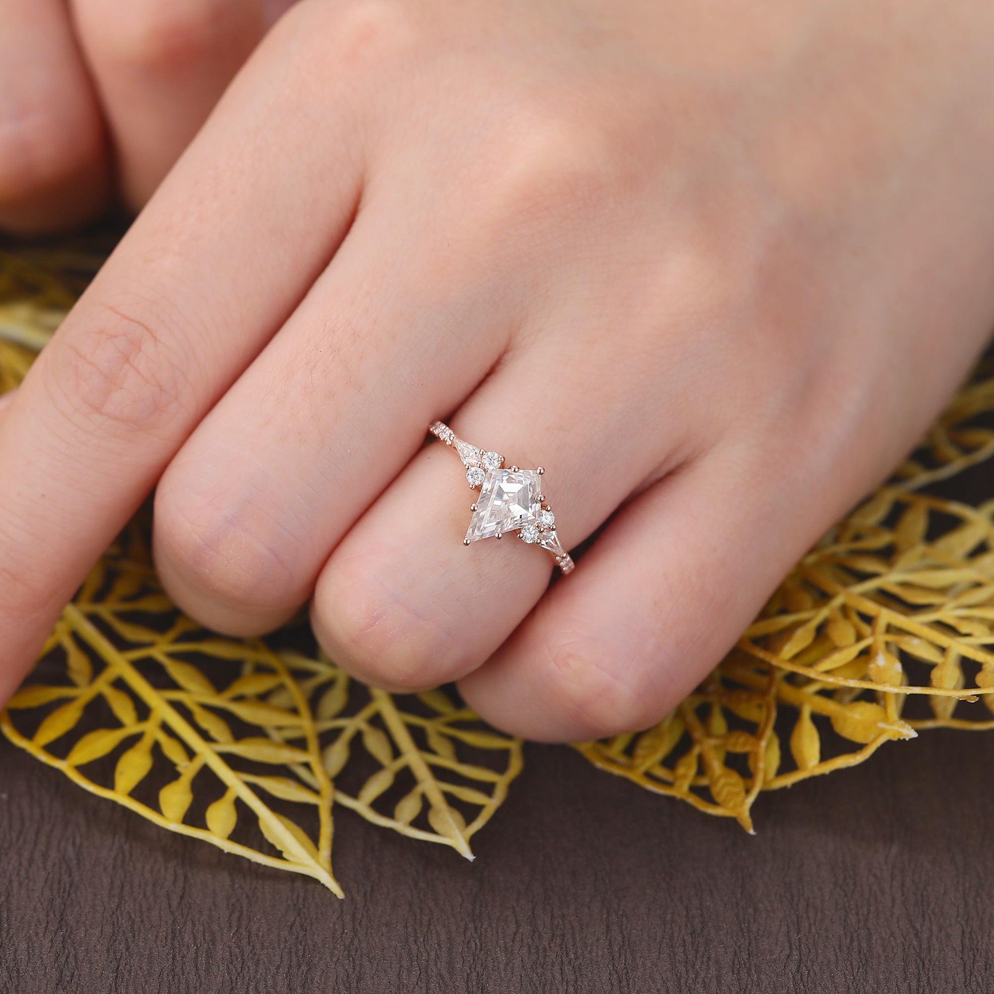 Kite cut moissanite rose gold engagement Ring.
