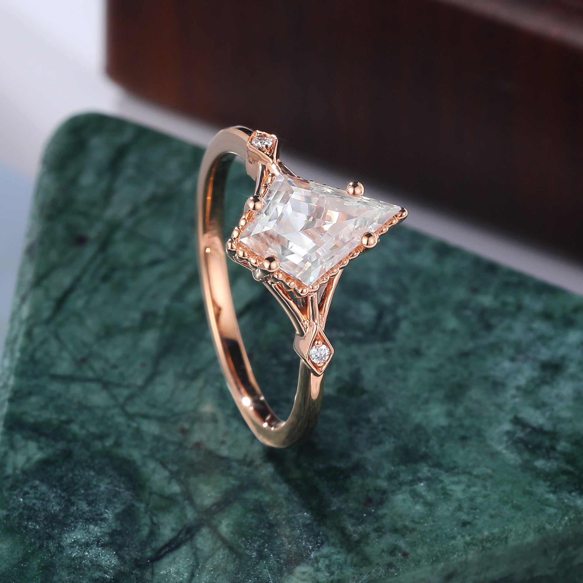 Kite cut moissanite rose gold engagement Ring.